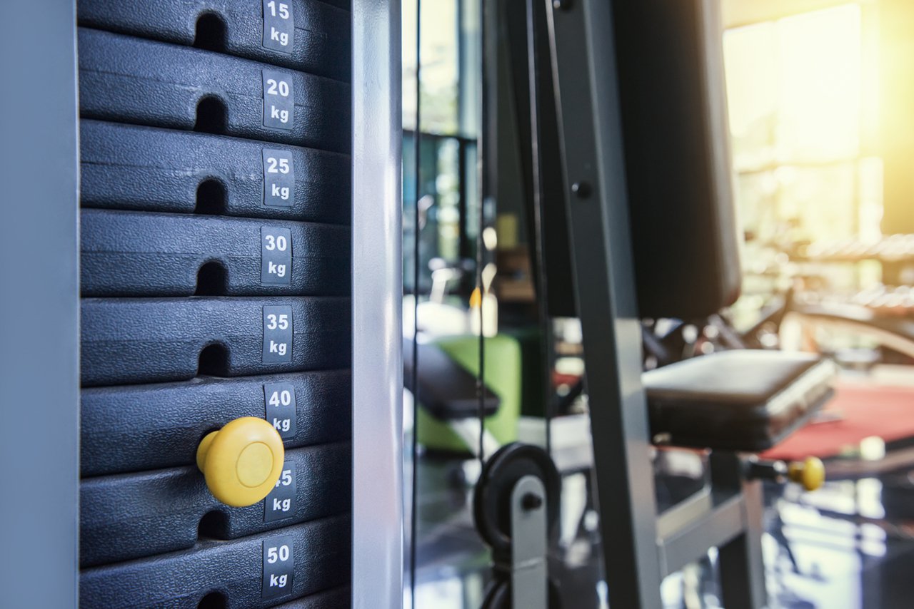 gym weights and cable machine